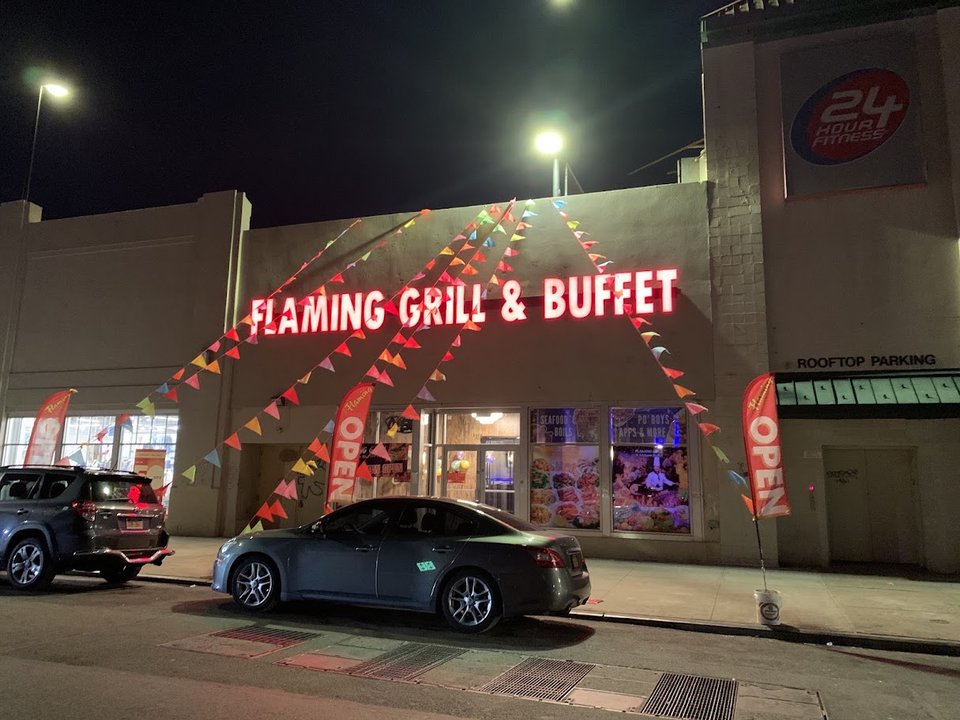 Front view of Flaming Grill & Buffet in Brooklyn.